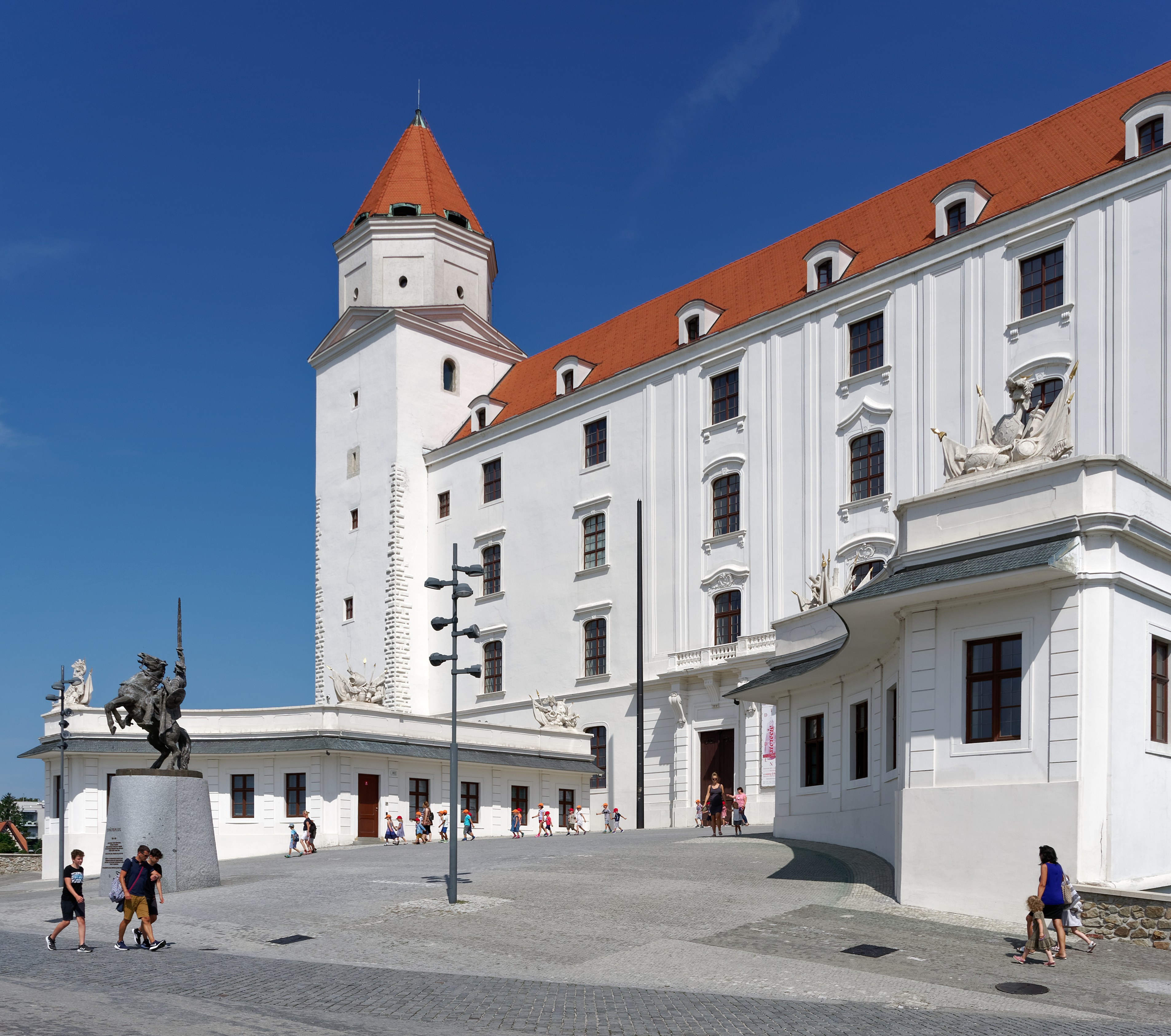 Bratislava Castle on the hill above the Danube, pale walls and a red roof